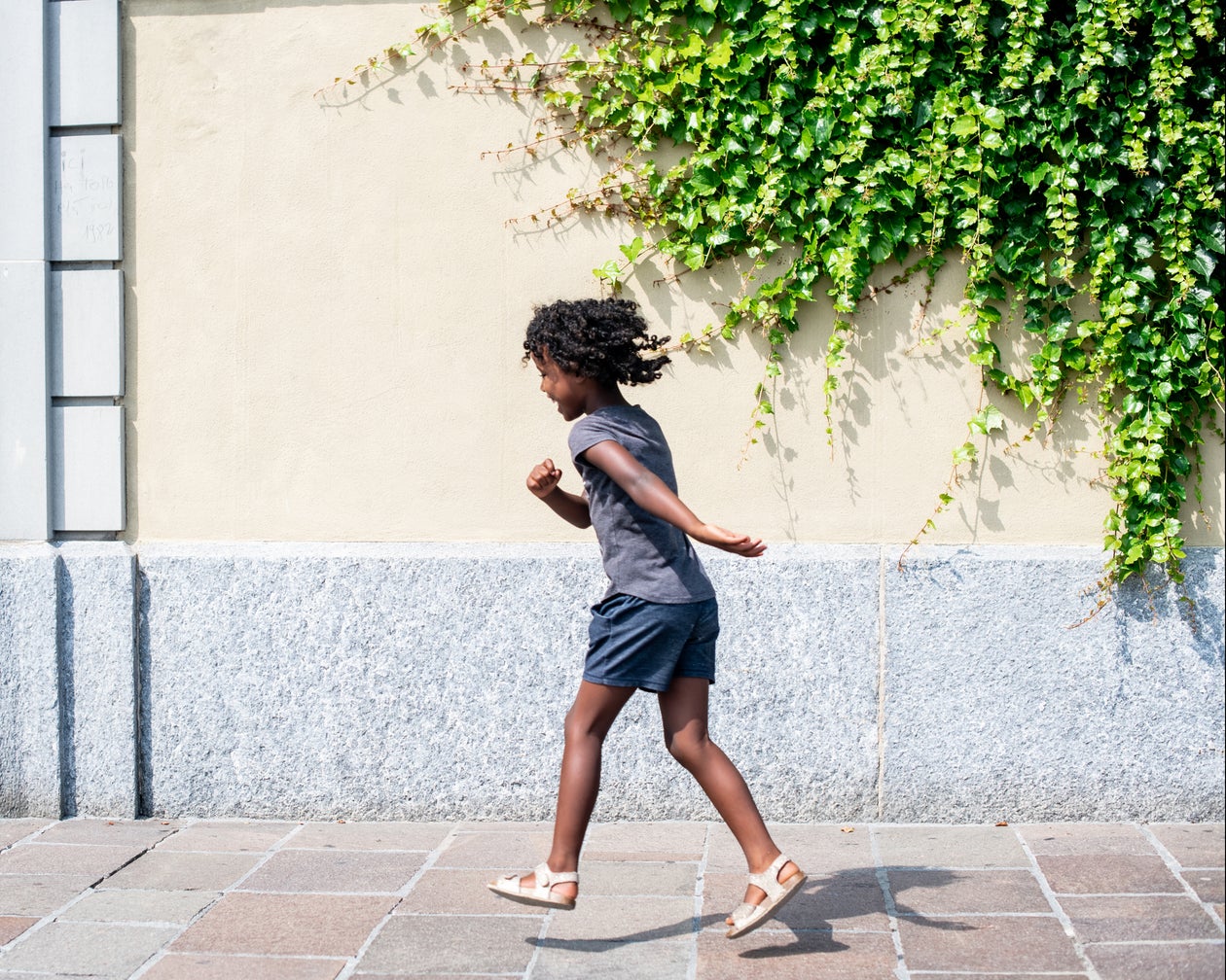 Girl playing outdoors