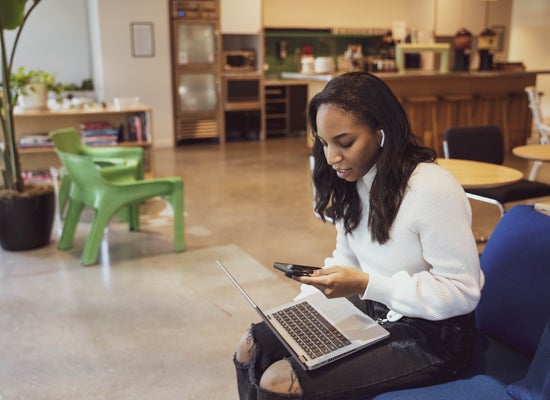 Black woman viewing a customer academy page