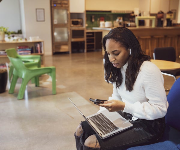 Black woman working on laptop