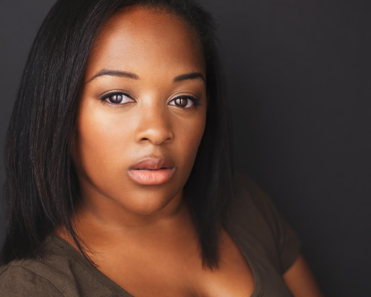 Woman posing for a headshot