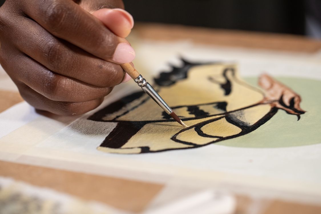 Artist painting on canvas