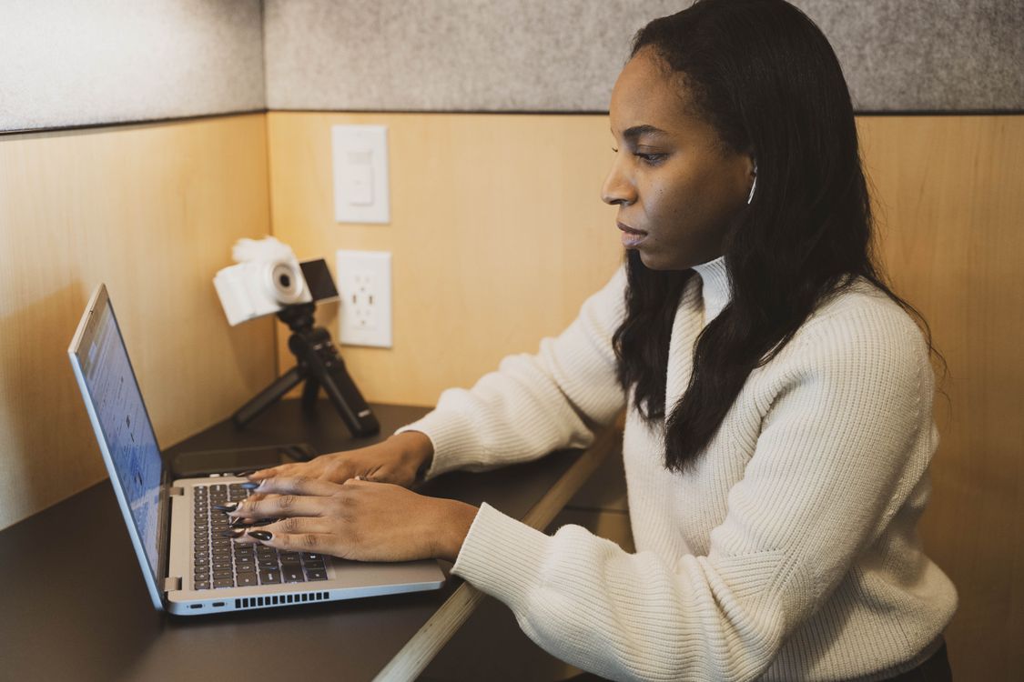 Woman Working from Home with Laptop