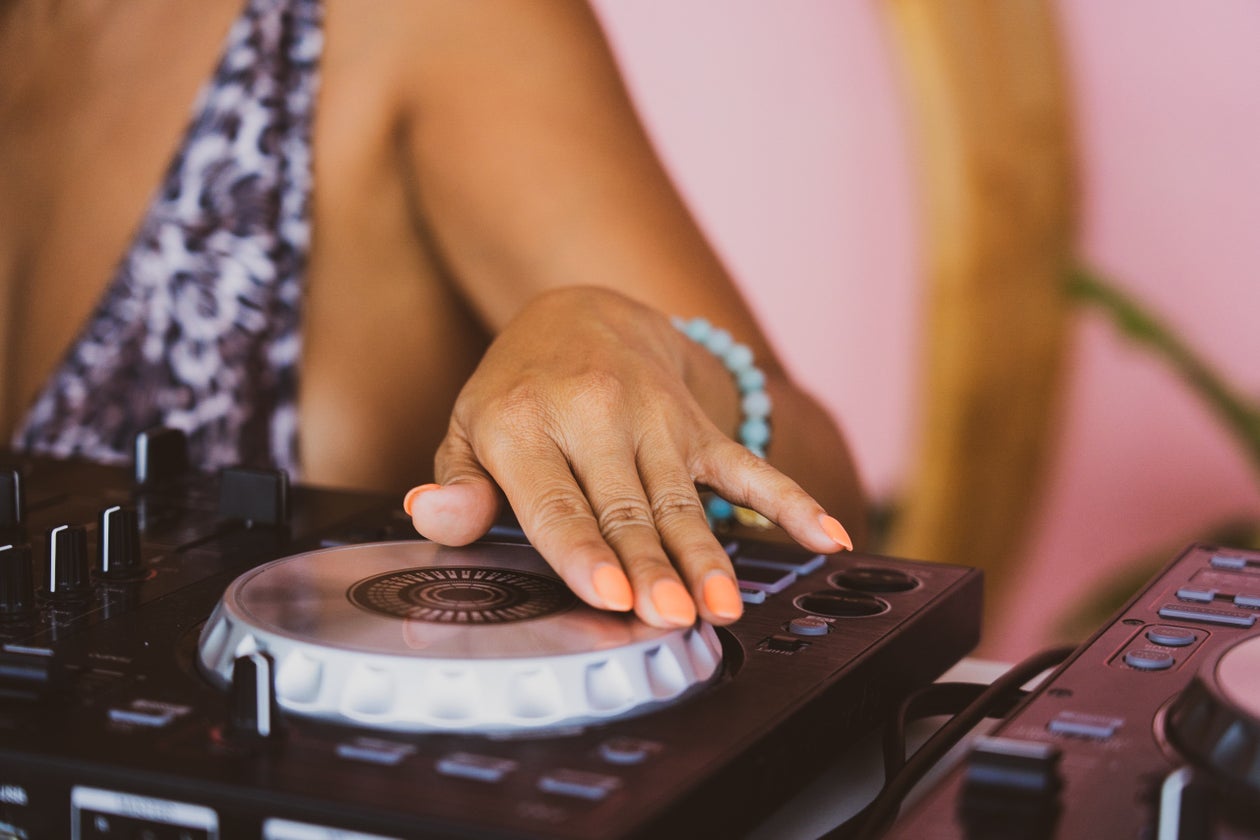 Hand on DJ Turntable