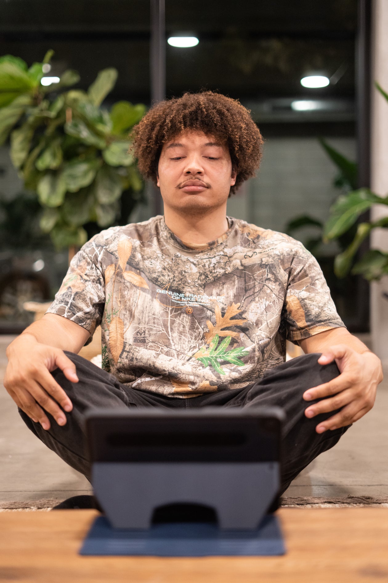 Man looking at tablet