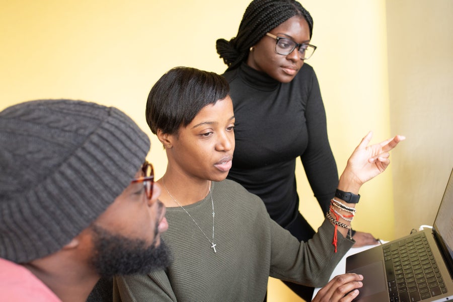 Black professionals in business meeting