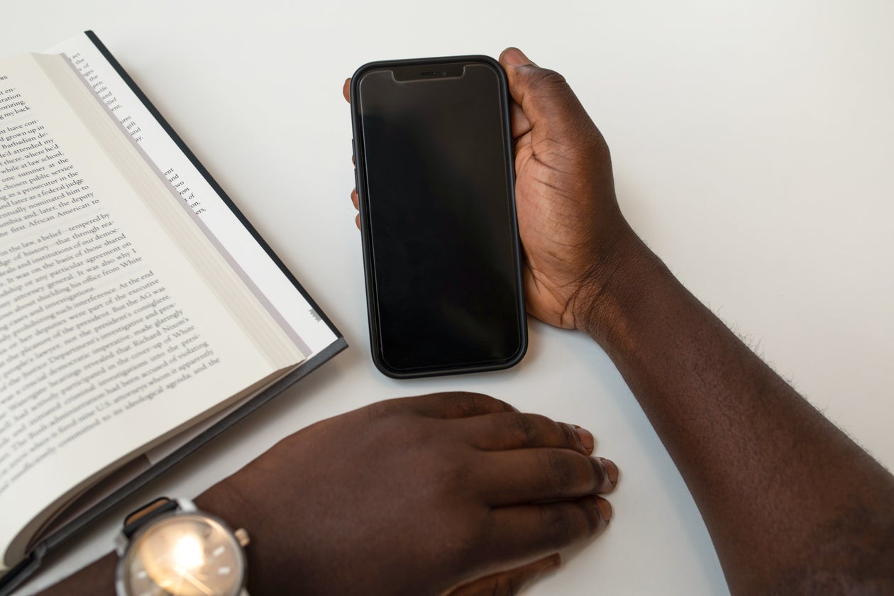 Person holding a phone