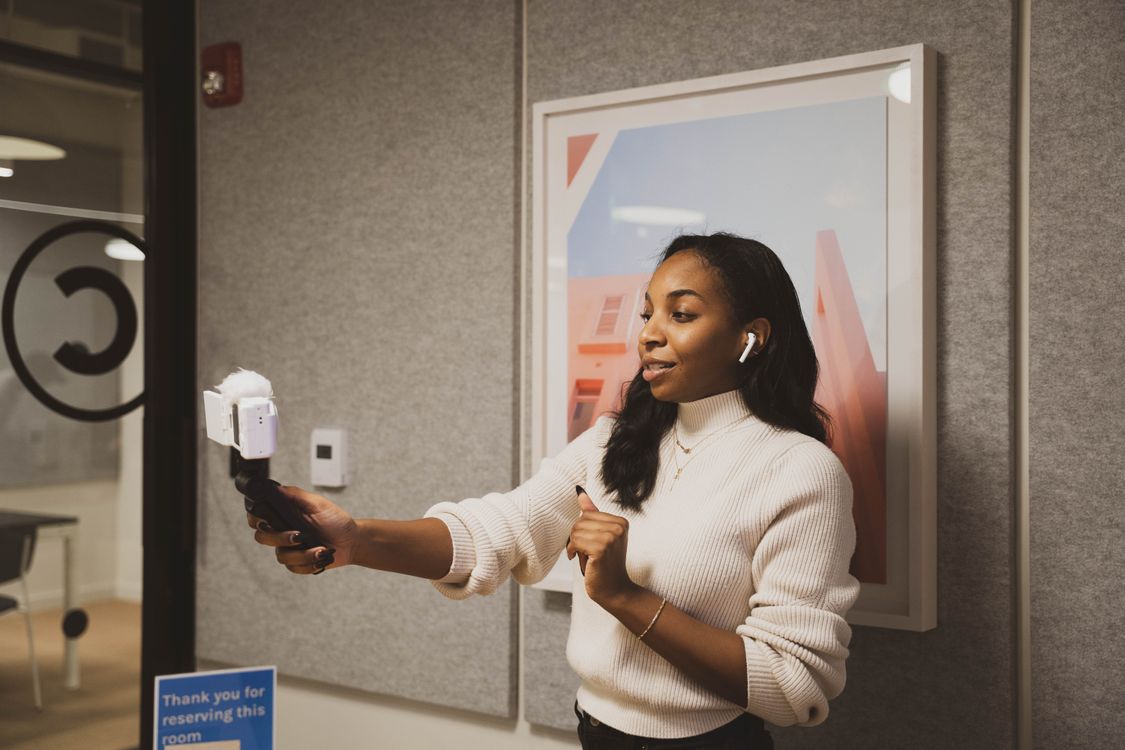 Woman Recording a Vlog