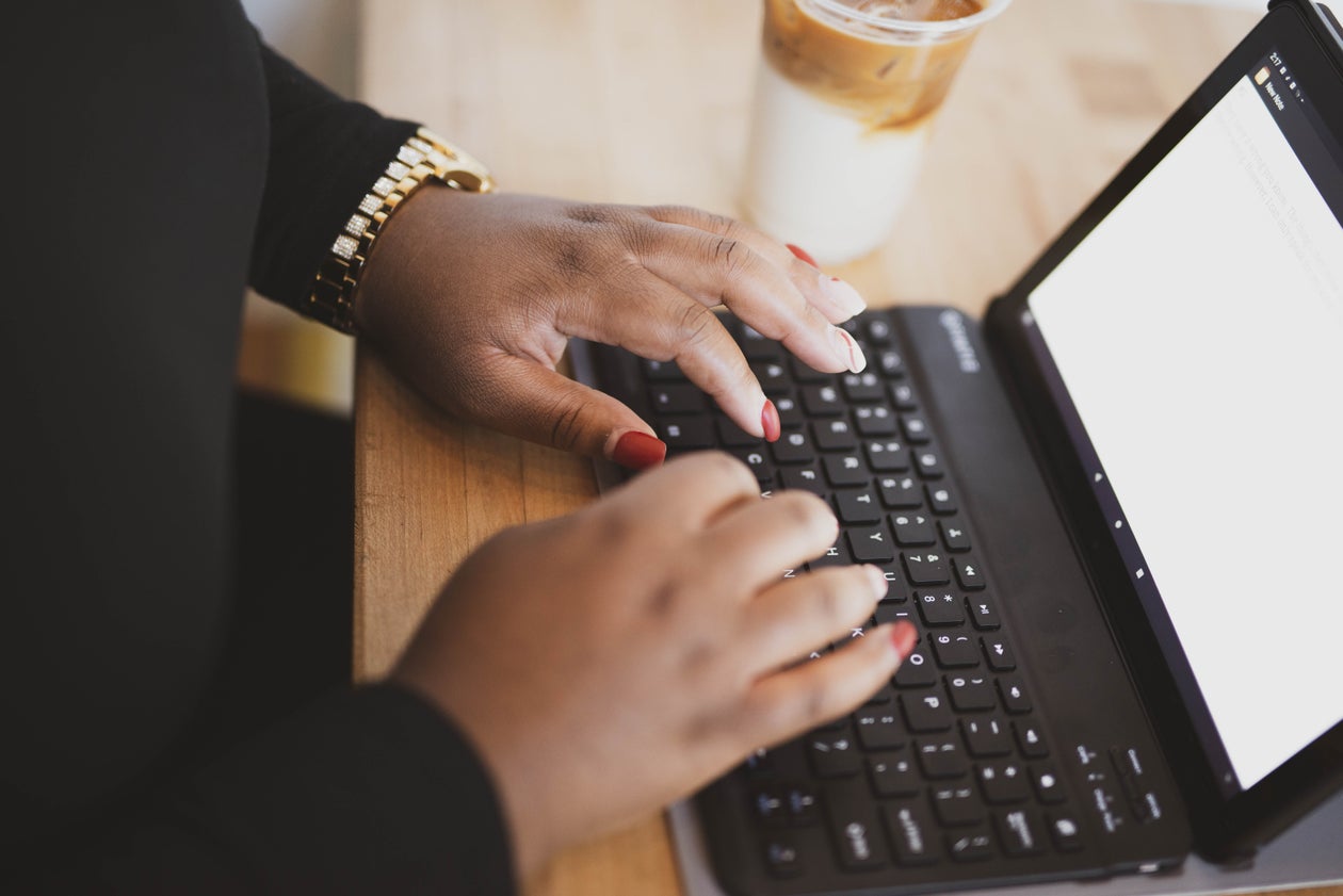 Close-up of Woman and Her Tablet
