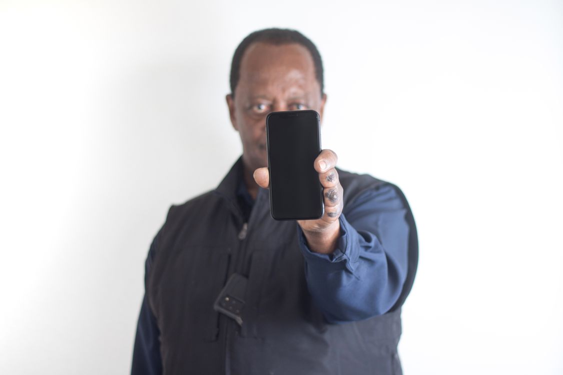Man holding up a phone