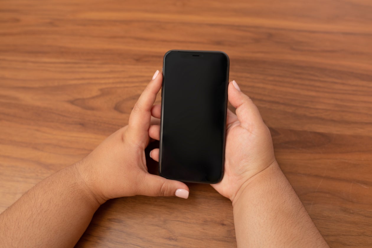 Person holding a phone