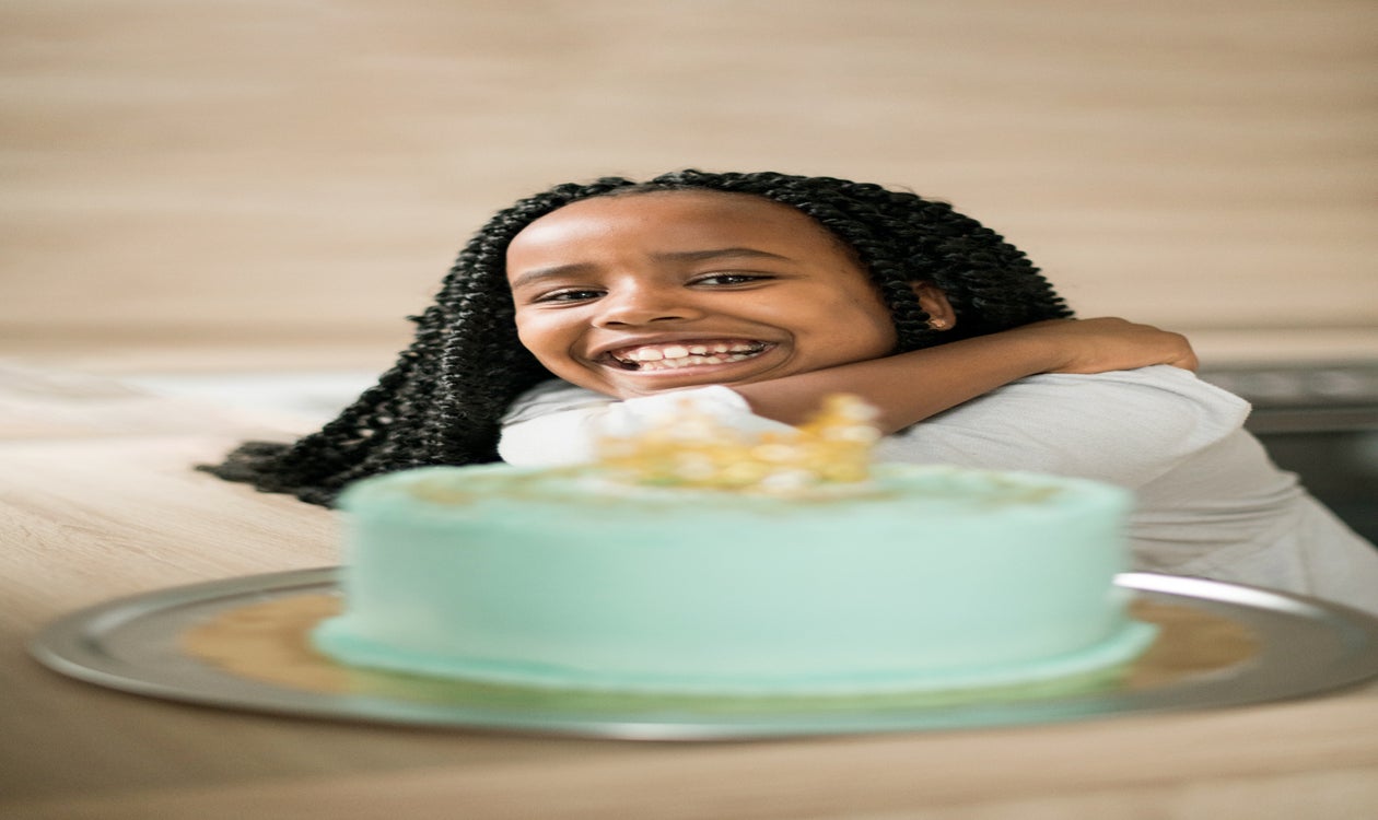 Girl with Birthday Cake