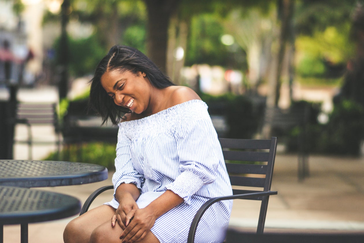 Woman sitting outdoors