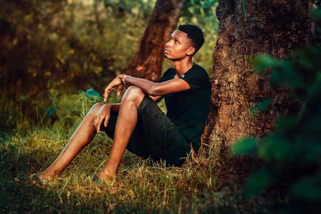 Man sitting on grass