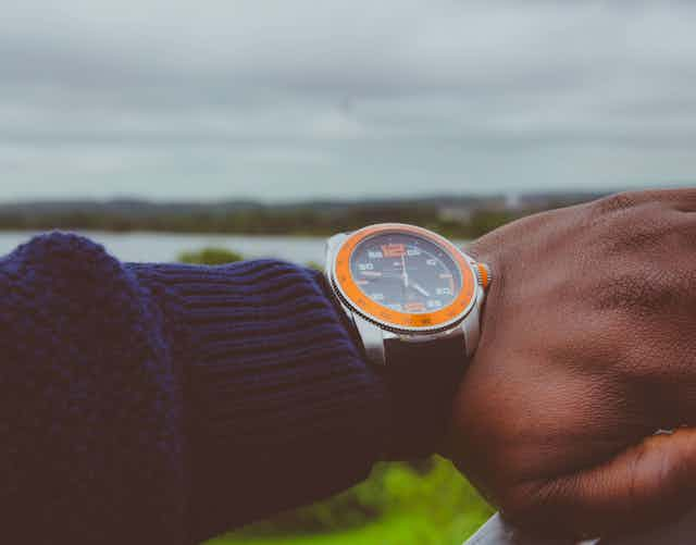 Man looking at his watch