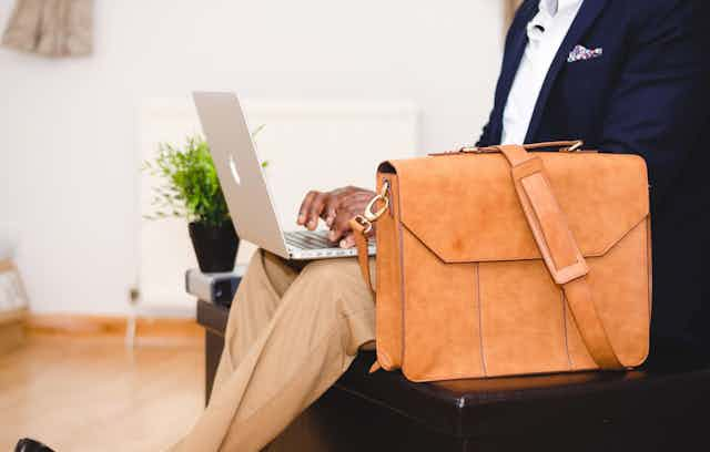 man using his computer