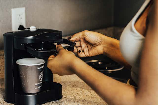 Woman making coffee