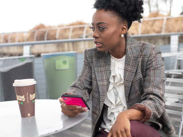 Woman texting on phone