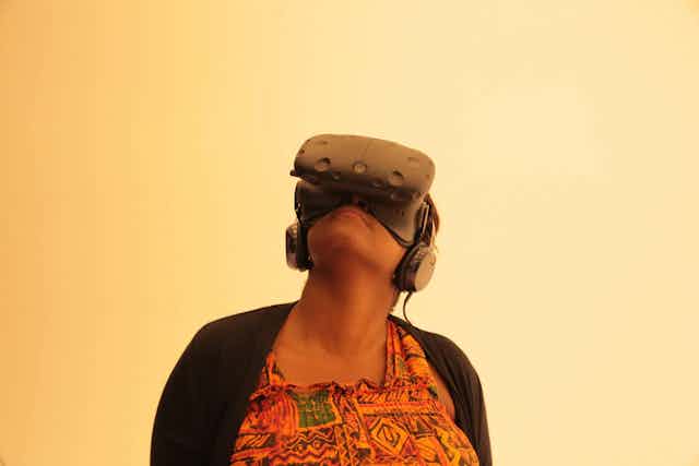 Woman with virtual reality headset on