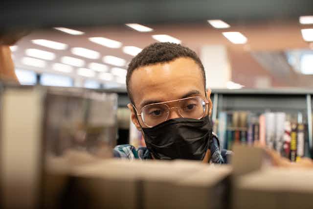 Man in library