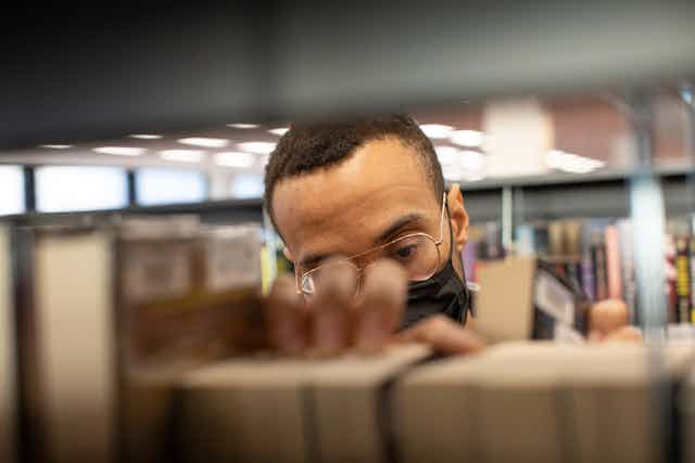 Man in library