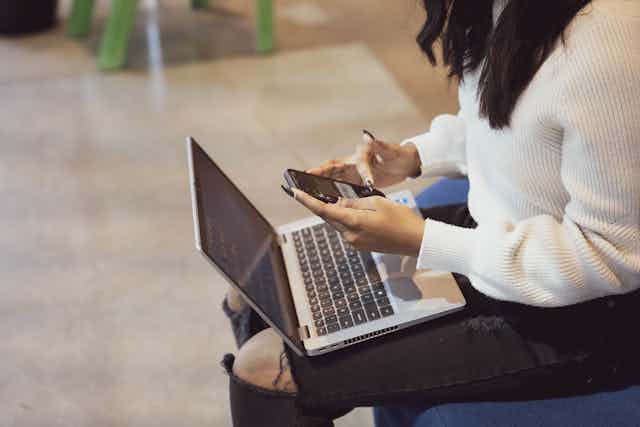 Female Entrepreneur Using Laptop