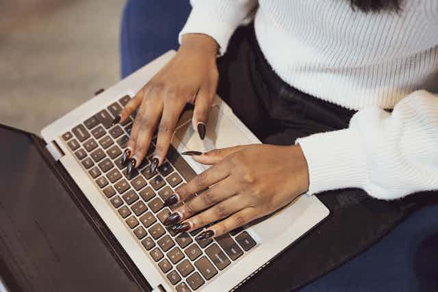 Close-up Shot of Woman on Laptop