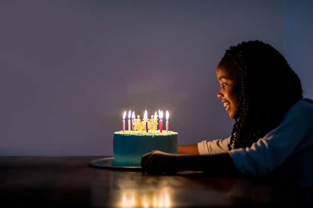 Girl with Birthday Candles 2