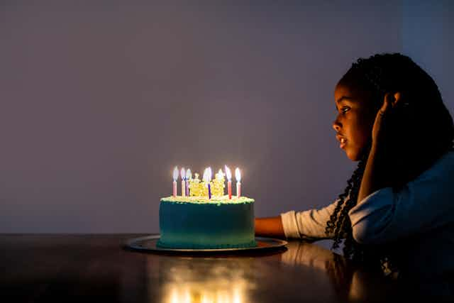 Girl with Birthday Candles