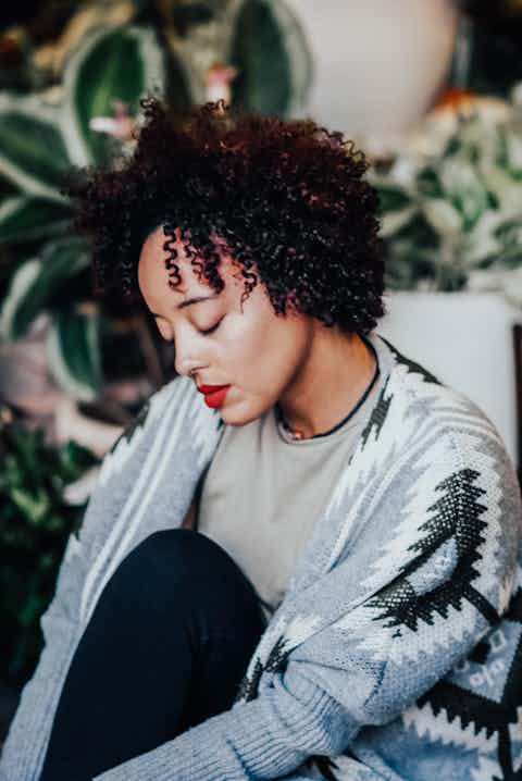 Woman in indoor garden