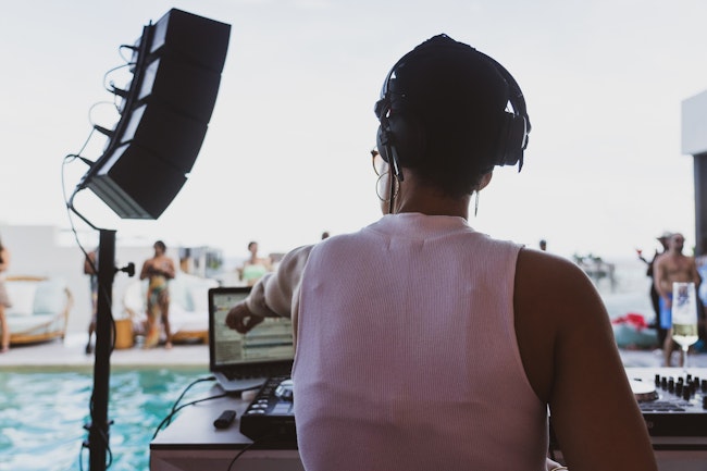DJ at a Poolside Party