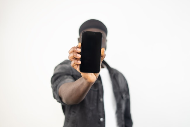 Man holding up a phone