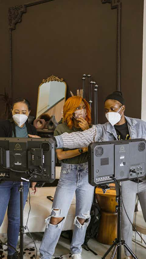 Black Woman behind equipment