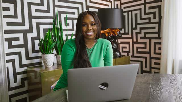 Black Woman Working with a Laptop